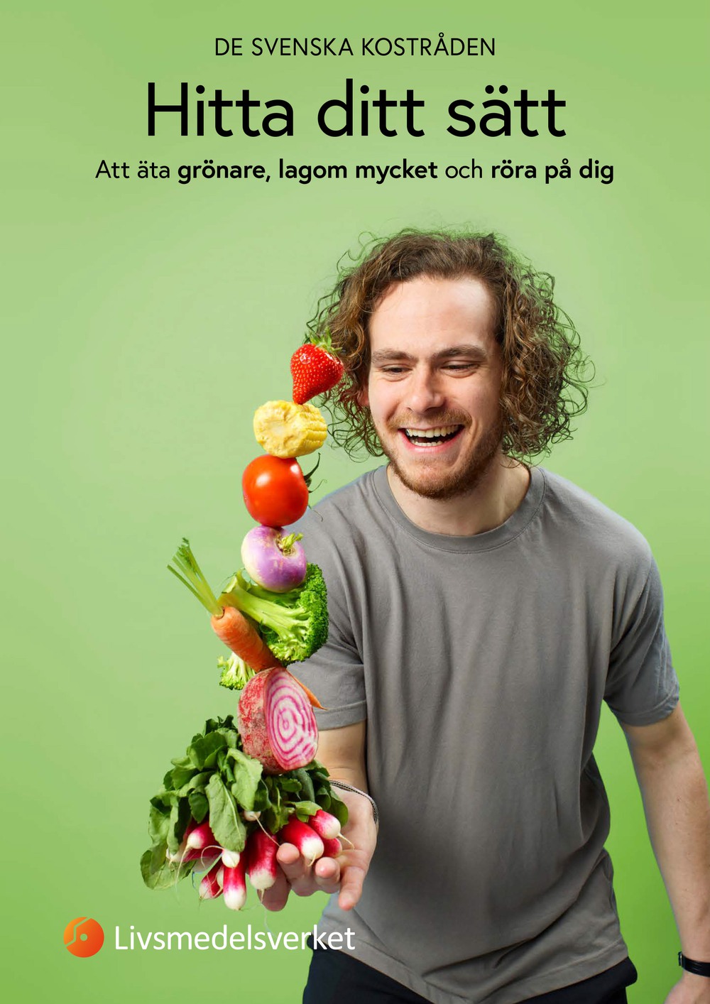 Framsidan av broschyren Hitta ditt sätt som beskriver de svenska kostråden. En man balanserar grönsaker i sin hand .