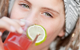 Girl drinking from glas